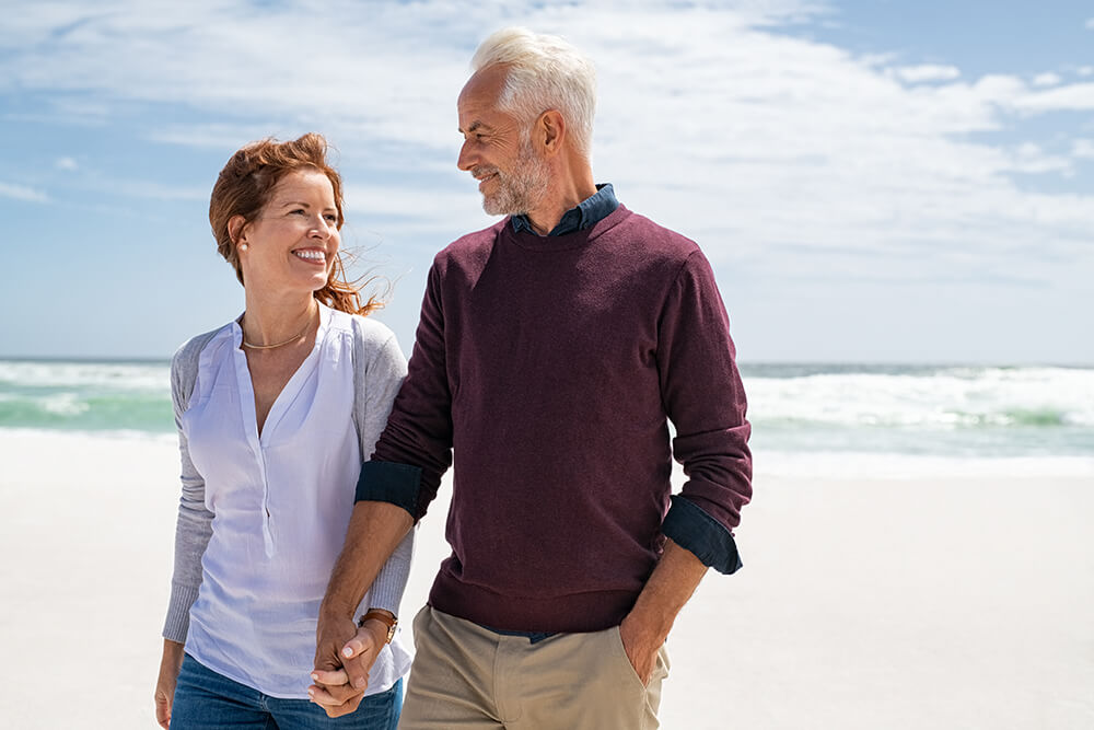 Happy-senior-couple-walking